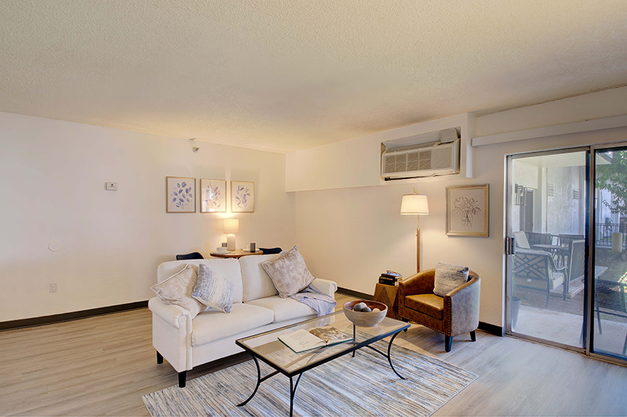Cozy living room with natural light and minimalist decor.