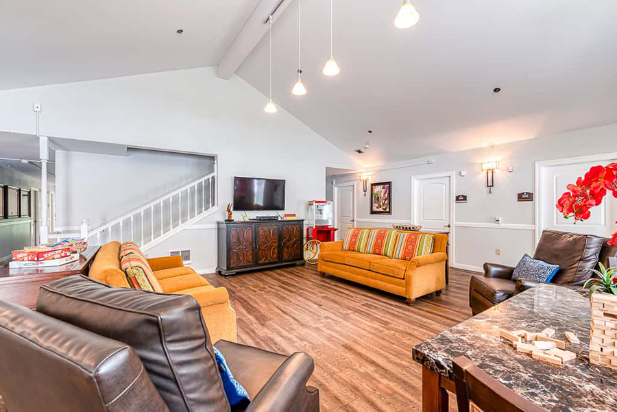 Cozy living area with multiple seating options and decor.