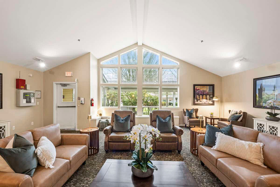 Bright, inviting lounge with comfortable seating and decor.