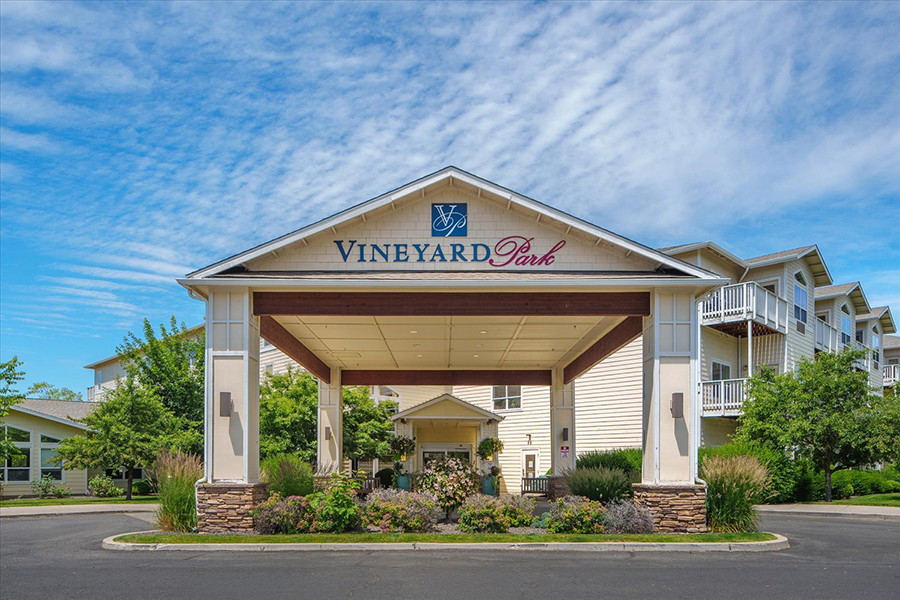 Entrance of Vineyard Park, featuring a welcoming architectural design.