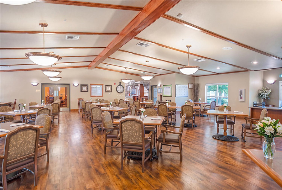 Spacious dining area with elegant decor and ample seating.