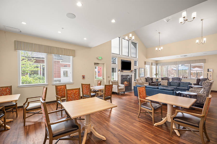 Bright, inviting lounge area with seating and dining spaces.