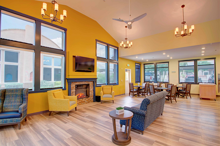 Cozy communal space with bright colors and seating options.