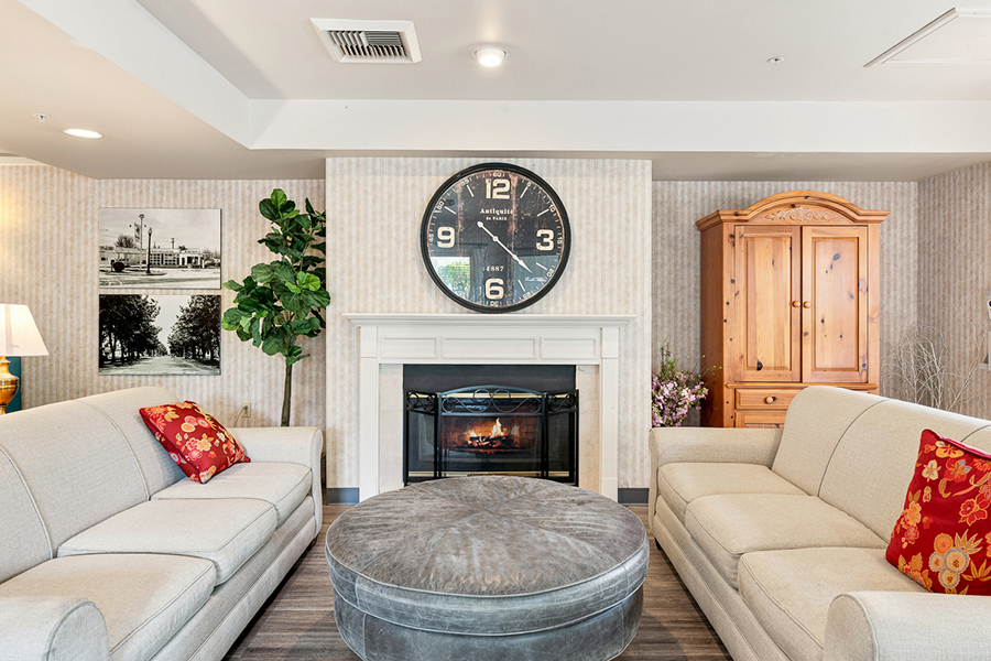 Cozy living room with fireplace and comfortable seating.