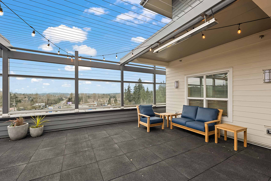 Cozy outdoor seating area with a scenic view.