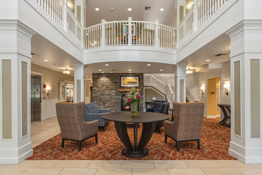 Spacious lobby with elegant seating and cozy decor.