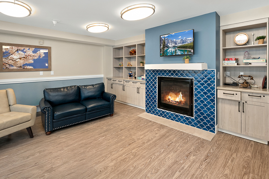 Cozy living space with fireplace and modern decor elements.