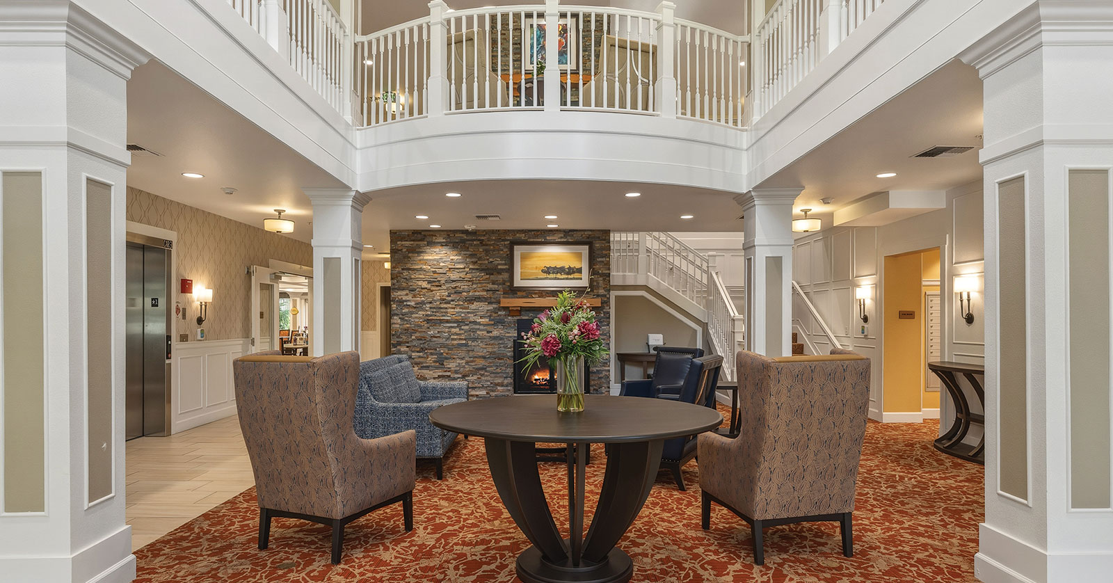 Spacious lobby with elegant seating and cozy decor.