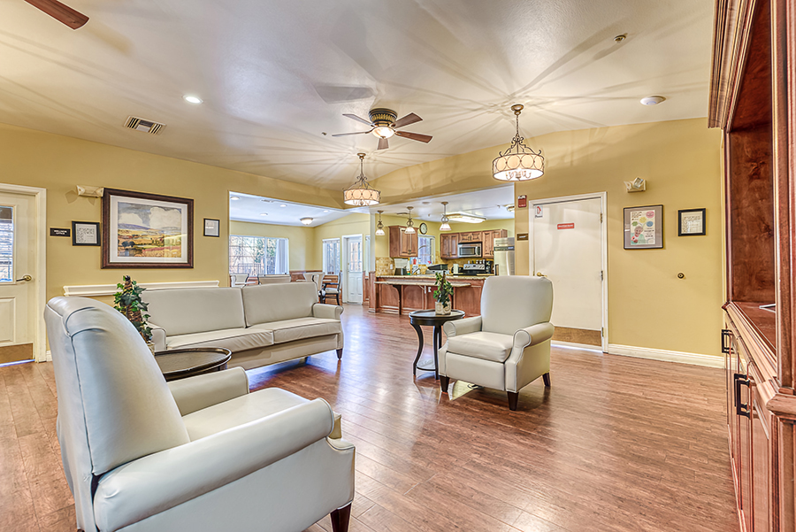 Cozy living area with comfortable seating and warm lighting.